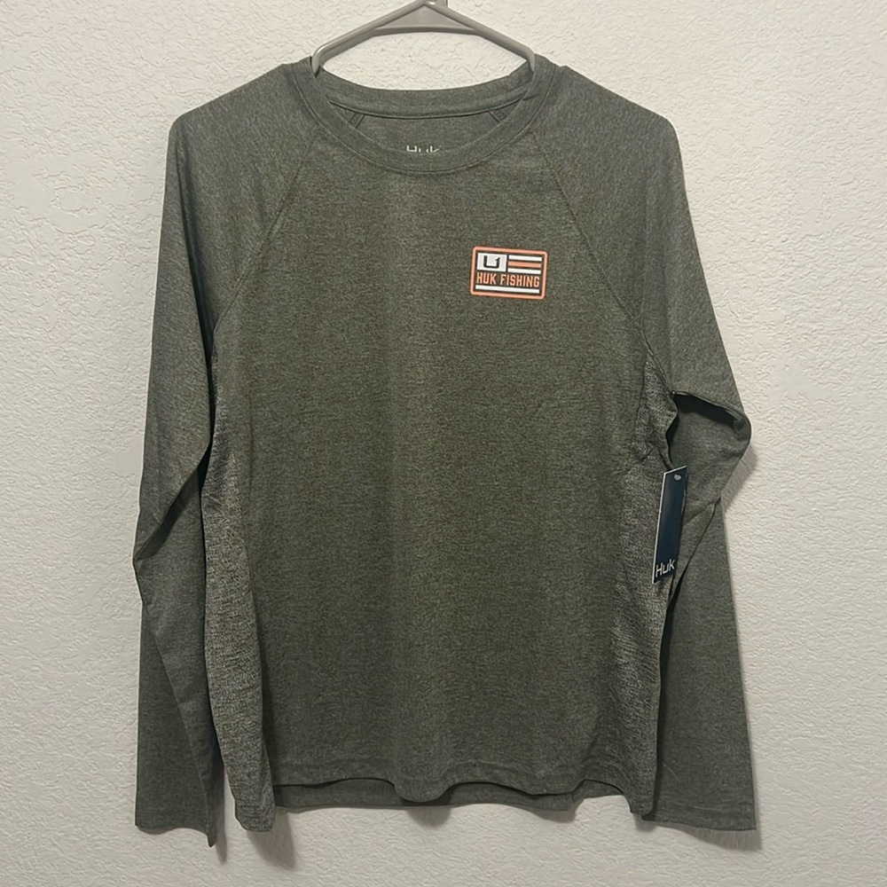 Huk fishing shirt, brand new! 100% polyester.